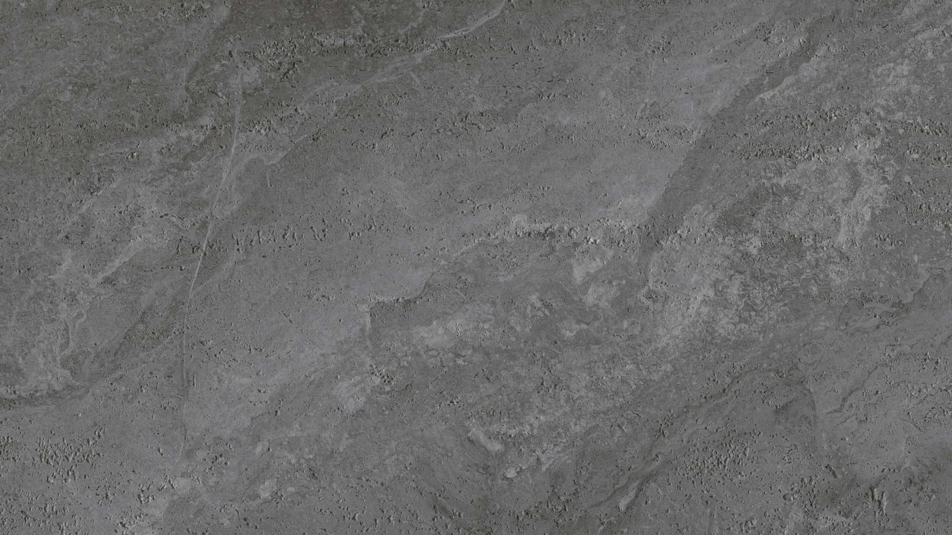 Detailed view of Angtai flexible stone in rough dark grey ember travertine texture.